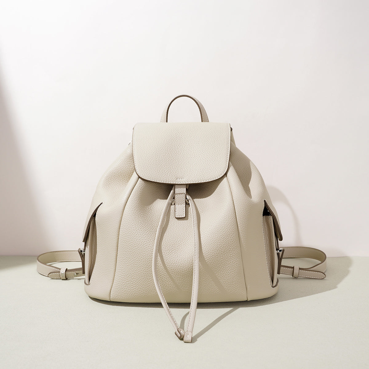 Women's Leather Drawstring Flap Backpack by Pevell, view 6