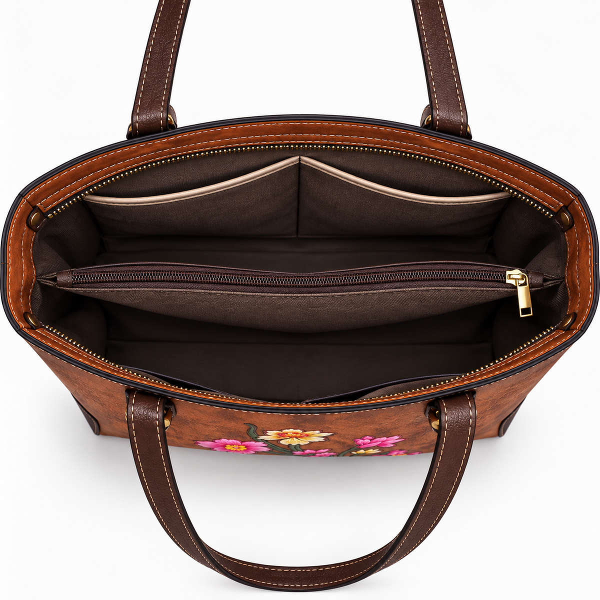 Open brown tote showing zippered center compartment and slip pockets