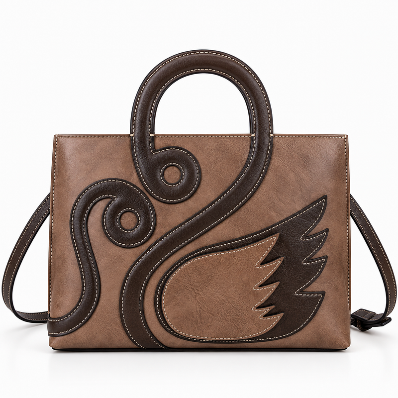 Brown leather tote with swan-neck handle and stitched wing design