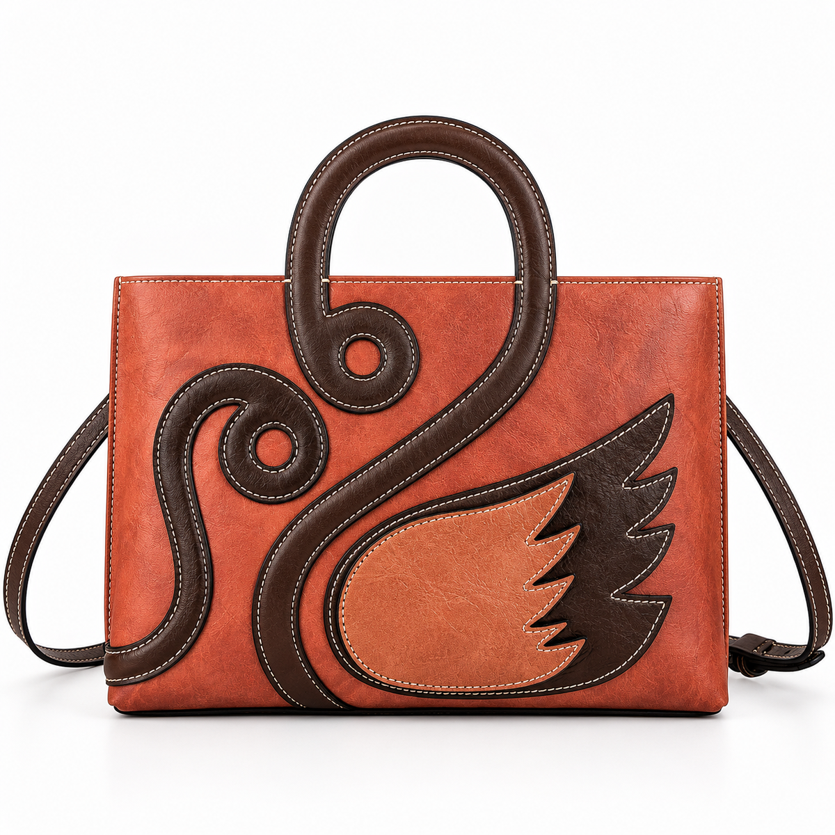 Orange leather tote with swan-neck handle and tan wing