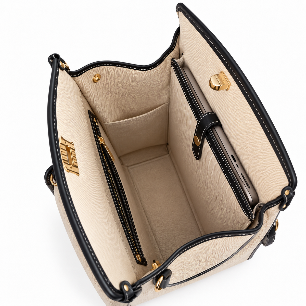 Open backpack showing laptop sleeve and beige lining with black trim