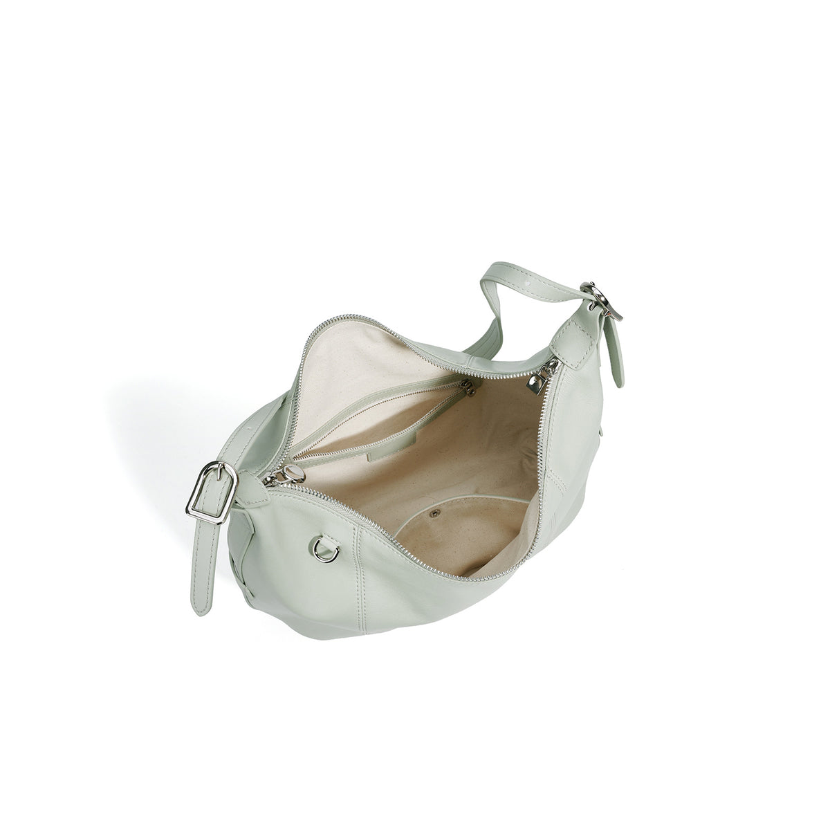 Top view of the open hobo bag showing the zip closure and beige lining